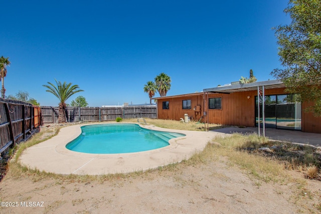 9552 E Irene St, Tucson, AZ 85730 - view of pool with a fenced backyard and a patio
