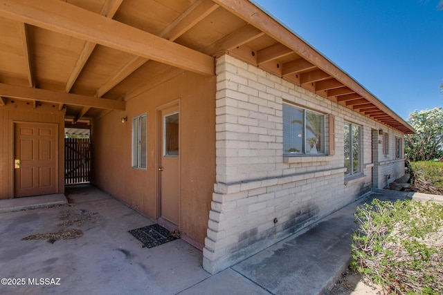 9552 E Irene St, Tucson, AZ 85730 - view of home's exterior with brick siding
