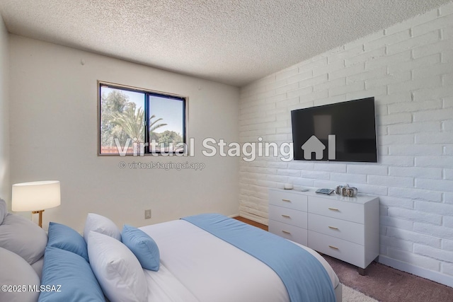 9552 E Irene St, Tucson, AZ 85730 - carpeted bedroom with a textured ceiling