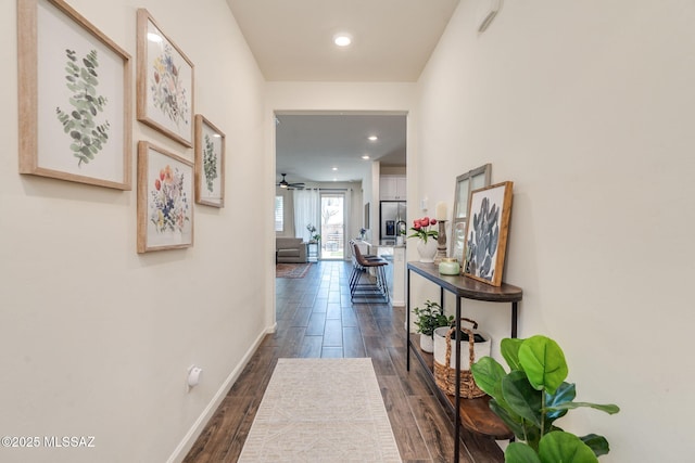 3287 W Sunlit Peak Dr, Tucson, AZ 85742 - corridor with dark wood finished floors, baseboards, and recessed lighting