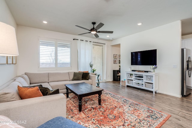 3287 W Sunlit Peak Dr, Tucson, AZ 85742 - living room with a ceiling fan, light wood-style flooring, recessed lighting, and baseboards