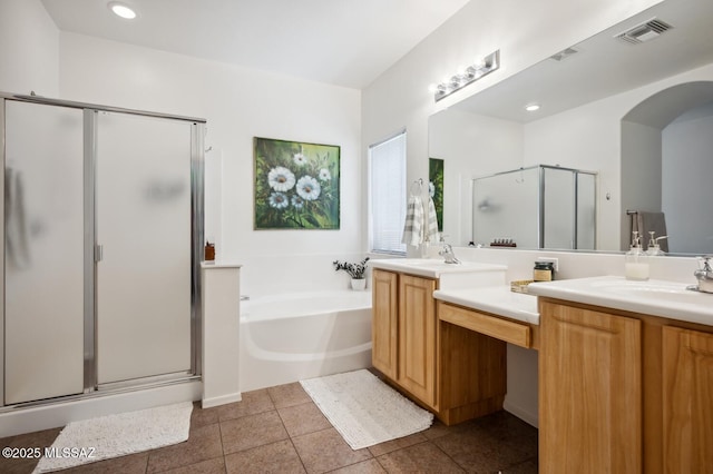9225 S Summer Breeze Ln, Tucson, AZ 85756 - full bath featuring a stall shower, double vanity, a bath, tile patterned flooring, and recessed lighting