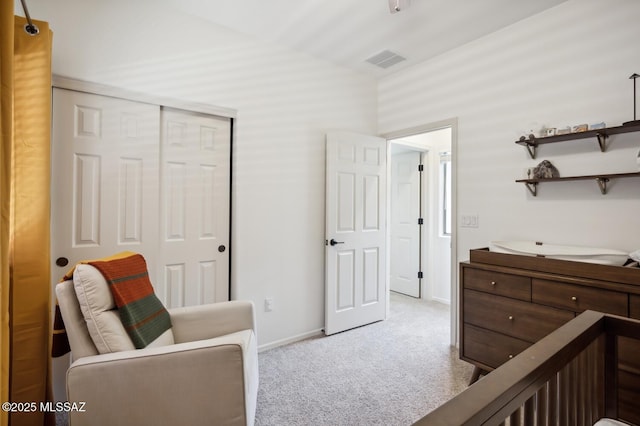 9225 S Summer Breeze Ln, Tucson, AZ 85756 - bedroom with light colored carpet, a closet, and baseboards