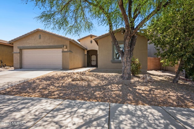 9225 S Summer Breeze Ln, Tucson, AZ 85756 - mediterranean / spanish home with an attached garage, stucco siding, concrete driveway, and a tiled roof