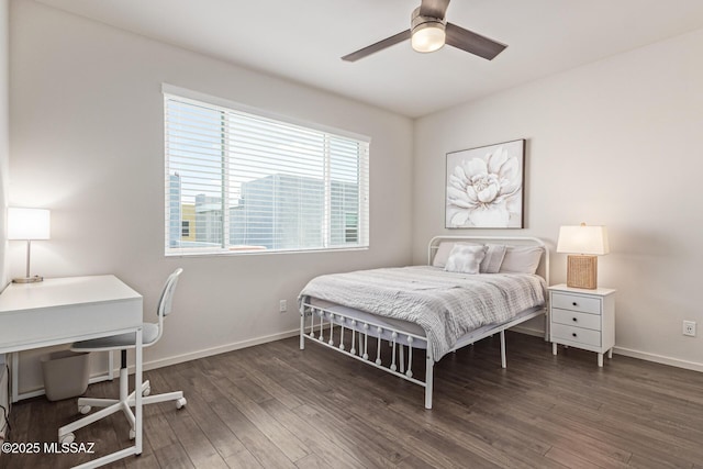 890 E Millenium Ct Unit E, Tucson, AZ 85719 - bedroom with wood finished floors, baseboards, a desk, and ceiling fan