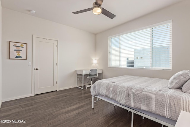 890 E Millenium Ct Unit E, Tucson, AZ 85719 - bedroom featuring wood finished floors, baseboards, and ceiling fan