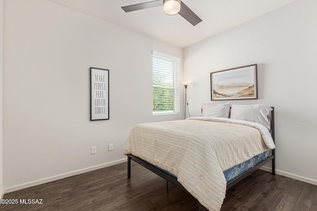 890 E Millenium Ct Unit E, Tucson, AZ 85719 - bedroom featuring dark wood finished floors, baseboards, and ceiling fan