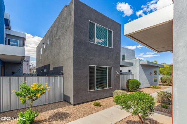 890 E Millenium Ct Unit E, Tucson, AZ 85719 - view of property exterior with stucco siding