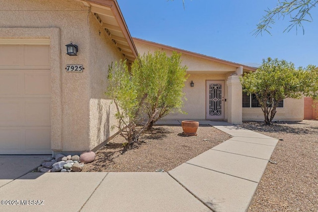 7925 S Danforth Ave, Tucson, AZ 85747 - entrance to property featuring stucco siding and a garage