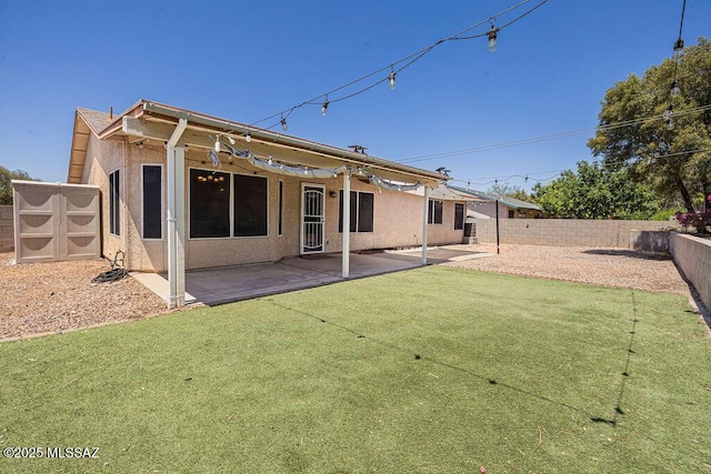 7925 S Danforth Ave, Tucson, AZ 85747 - rear view of property featuring stucco siding and a patio