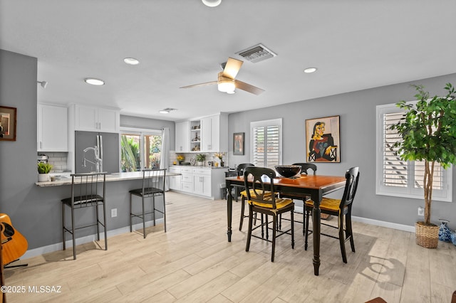 9000 N Twain St, Tucson, AZ 85742 - dining space with plenty of natural light, light wood-style floors, recessed lighting, a ceiling fan, and baseboards