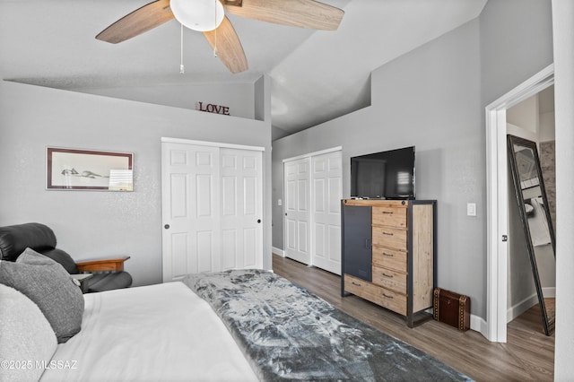 9000 N Twain St, Tucson, AZ 85742 - bedroom featuring wood finished floors, lofted ceiling, baseboards, and a ceiling fan