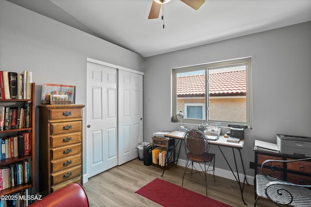9000 N Twain St, Tucson, AZ 85742 - home office featuring ceiling fan, wood finished floors, lofted ceiling, and baseboards