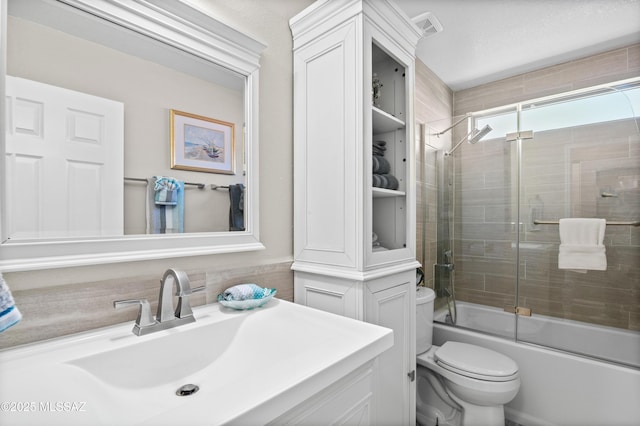 9000 N Twain St, Tucson, AZ 85742 - bathroom with toilet, shower / bath combination with glass door, and vanity