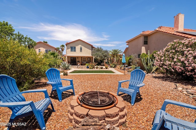 9000 N Twain St, Tucson, AZ 85742 - view of patio featuring a fire pit