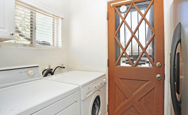 2422 E Drachman St, Tucson, AZ 85719 - laundry room with cabinet space and washing machine and dryer