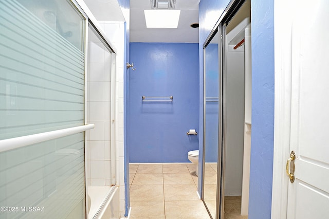 2422 E Drachman St, Tucson, AZ 85719 - full bathroom featuring toilet, tile patterned floors, and bath / shower combo with glass door