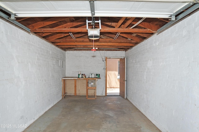 2422 E Drachman St, Tucson, AZ 85719 - garage featuring a garage door opener