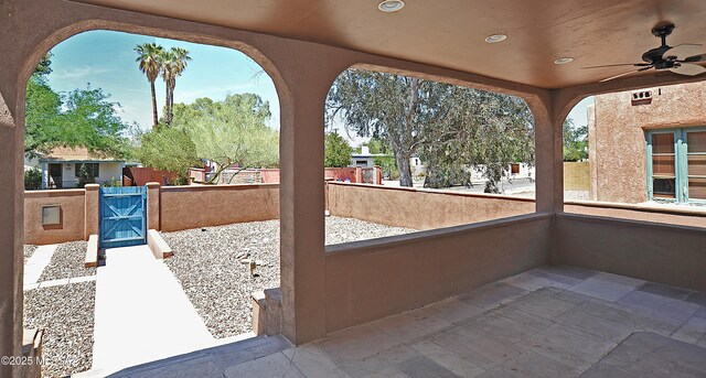 2422 E Drachman St, Tucson, AZ 85719 - view of patio / terrace featuring ceiling fan and a gate
