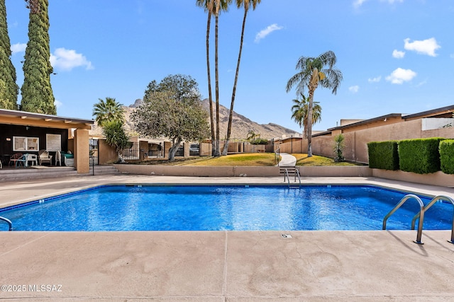 242 E Calle Turquesa, Tucson, AZ 85704 - community pool featuring a mountain view and a patio