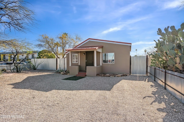 966 N Richey Blvd, Tucson, AZ 85716 - view of front of home with stucco siding and a fenced backyard