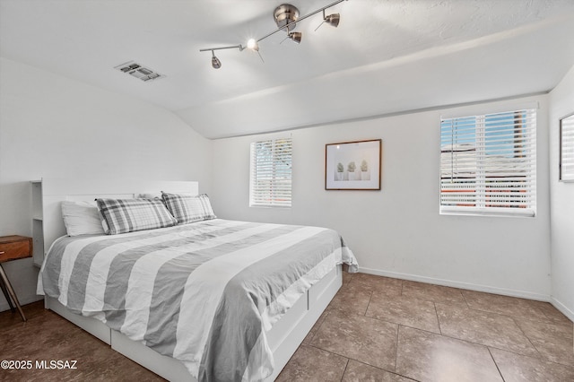 966 N Richey Blvd, Tucson, AZ 85716 - bedroom featuring vaulted ceiling and baseboards