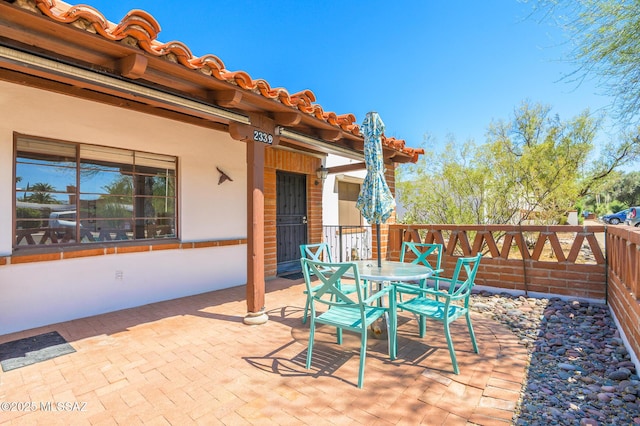 233 S Paseo Tierra Unit D, Green Valley, AZ 85614 - view of patio / terrace featuring outdoor dining space