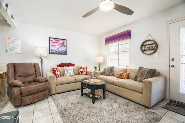 233 S Paseo Tierra Unit D, Green Valley, AZ 85614 - living room with light tile patterned floors and ceiling fan
