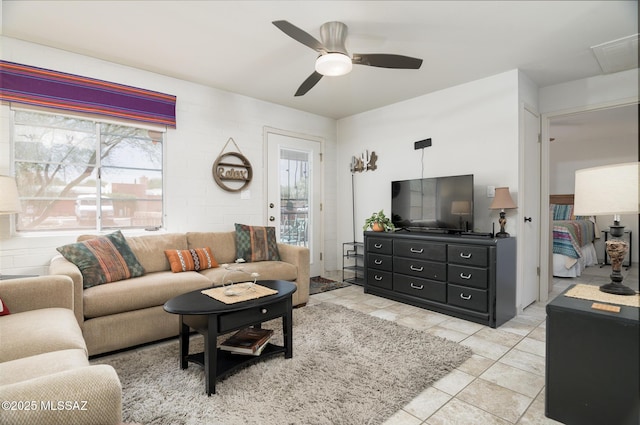 233 S Paseo Tierra Unit D, Green Valley, AZ 85614 - living area featuring ceiling fan and light tile patterned floors