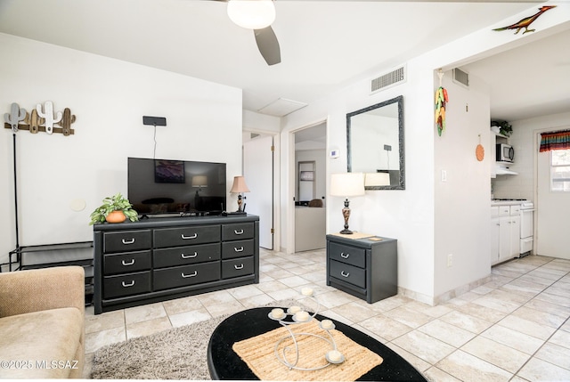233 S Paseo Tierra Unit D, Green Valley, AZ 85614 - living area with a ceiling fan and light tile patterned floors
