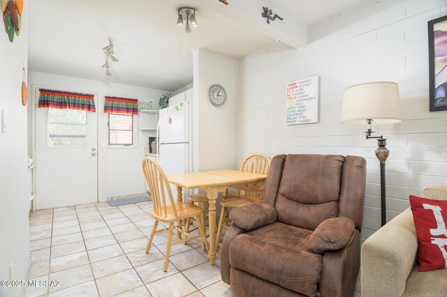 233 S Paseo Tierra Unit D, Green Valley, AZ 85614 - dining room with light tile patterned floors and beamed ceiling