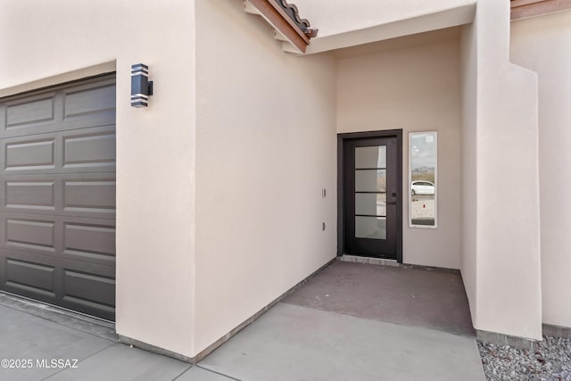 1917 Circulo Mexicali, Rio Rico, AZ 85648 - view of exterior entry featuring stucco siding and a garage