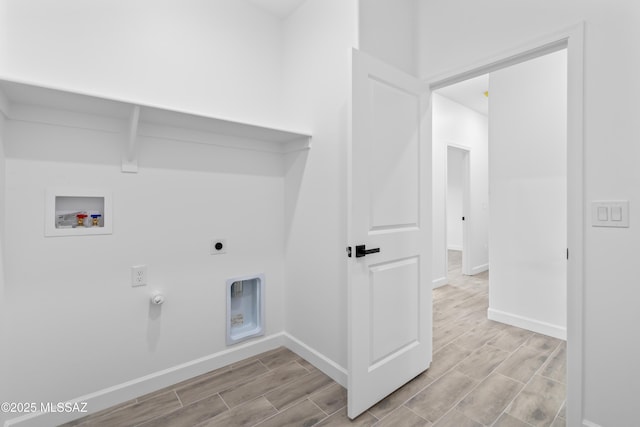 1917 Circulo Mexicali, Rio Rico, AZ 85648 - laundry area featuring hookup for a washing machine, hookup for an electric dryer, baseboards, wood tiled floors, and gas dryer hookup
