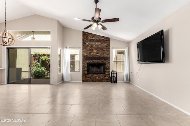 231 E Highcourte Ln, Tucson, AZ 85737 - unfurnished living room with lofted ceiling, plenty of natural light, ceiling fan, a chandelier, and a stone fireplace