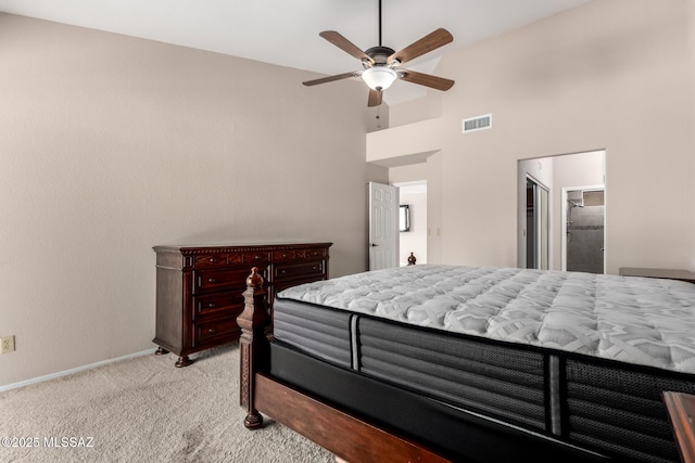 231 E Highcourte Ln, Tucson, AZ 85737 - bedroom featuring light carpet, baseboards, high vaulted ceiling, and a ceiling fan