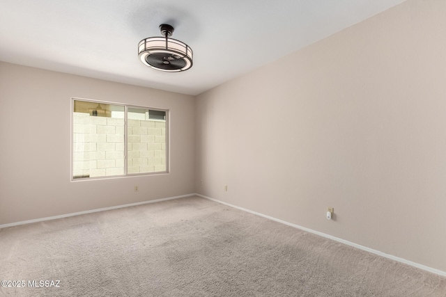 231 E Highcourte Ln, Tucson, AZ 85737 - carpeted empty room with baseboards