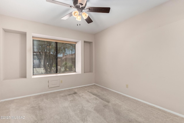 231 E Highcourte Ln, Tucson, AZ 85737 - empty room featuring carpet, baseboards, and a ceiling fan