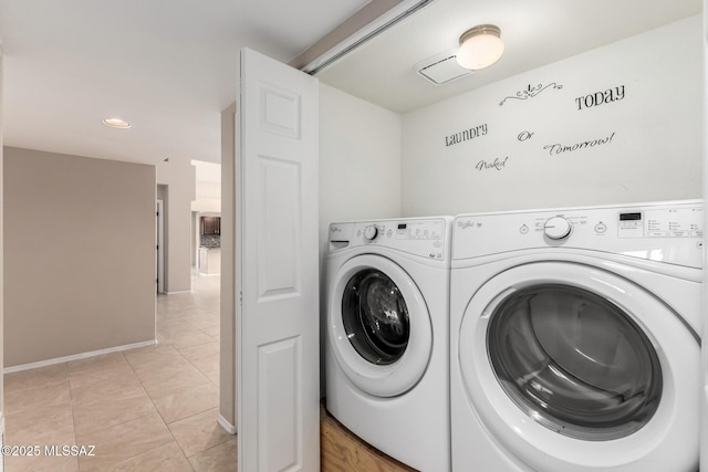 231 E Highcourte Ln, Tucson, AZ 85737 - laundry room featuring washing machine and clothes dryer, light tile patterned floors, recessed lighting, and baseboards