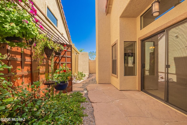 231 E Highcourte Ln, Tucson, AZ 85737 - fenced backyard with a patio