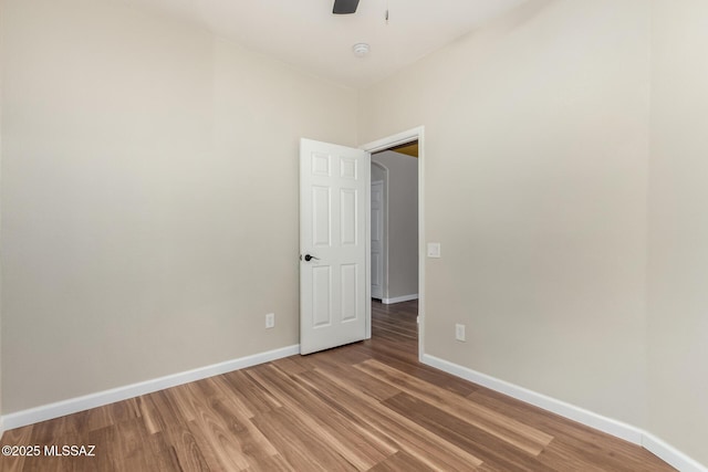 9102 N Safflower Ln, Tucson, AZ 85743 - empty room with light wood-type flooring, baseboards, and a ceiling fan