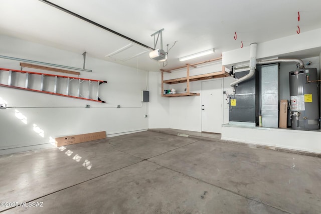 9102 N Safflower Ln, Tucson, AZ 85743 - garage with gas water heater and a garage door opener