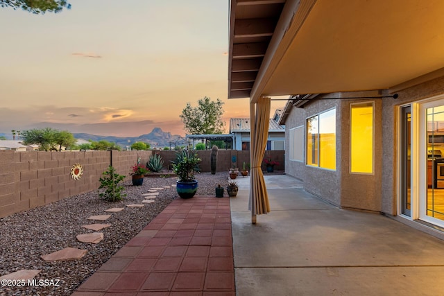 9102 N Safflower Ln, Tucson, AZ 85743 - fenced backyard featuring a patio