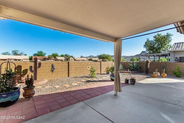 9102 N Safflower Ln, Tucson, AZ 85743 - fenced backyard with a patio area