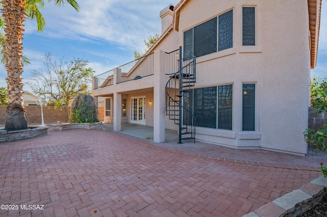 11562 N Scioto Ave, Tucson, AZ 85737 - back of house with stairs, a patio, and stucco siding
