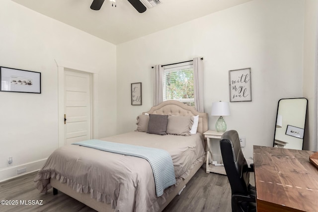 118 N Hoff Ave, Tucson, AZ 85705 - bedroom featuring wood finished floors, an office area, baseboards, and ceiling fan