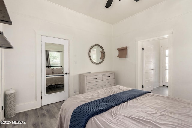 118 N Hoff Ave, Tucson, AZ 85705 - bedroom with wood finished floors, baseboards, and ceiling fan