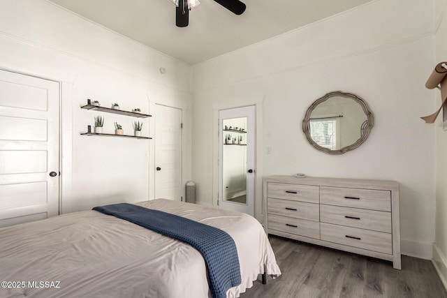 118 N Hoff Ave, Tucson, AZ 85705 - bedroom featuring dark wood-style flooring and ceiling fan