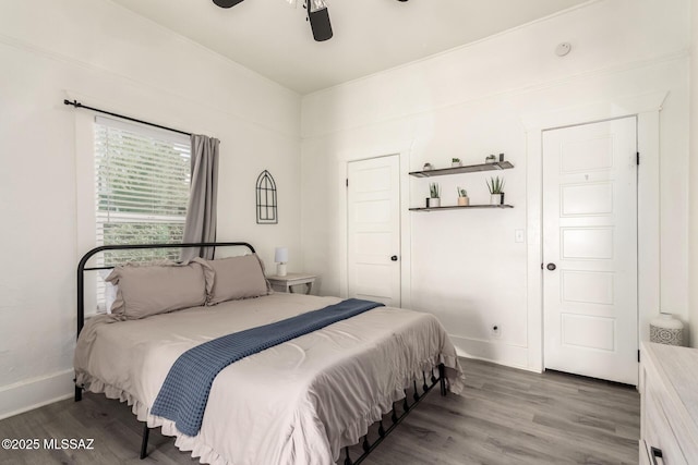 118 N Hoff Ave, Tucson, AZ 85705 - bedroom featuring baseboards, wood finished floors, and ceiling fan
