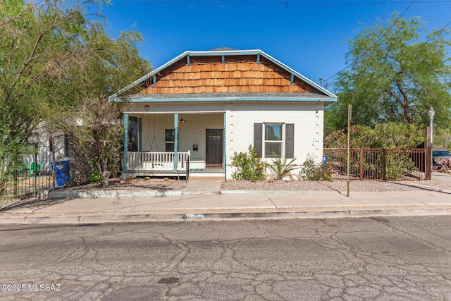 118 N Hoff Ave, Tucson, AZ 85705 - view of front of house featuring covered porch