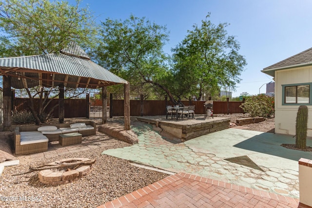 118 N Hoff Ave, Tucson, AZ 85705 - fenced backyard featuring a gazebo and a patio area